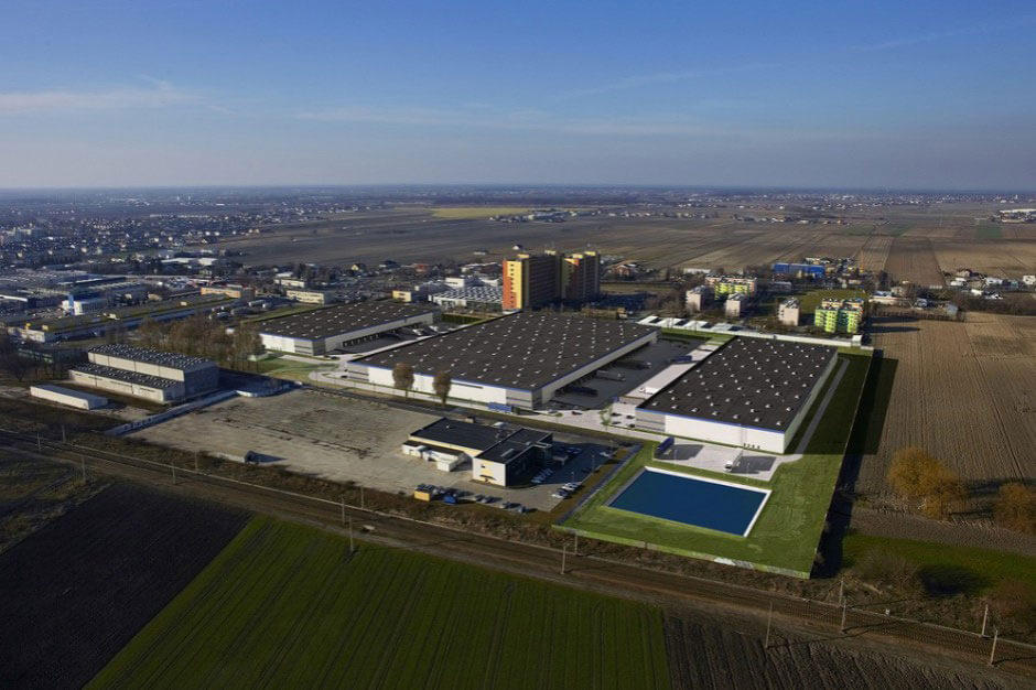 Aerial view of an office complex as Hillwood expanded to Europe and Canada.