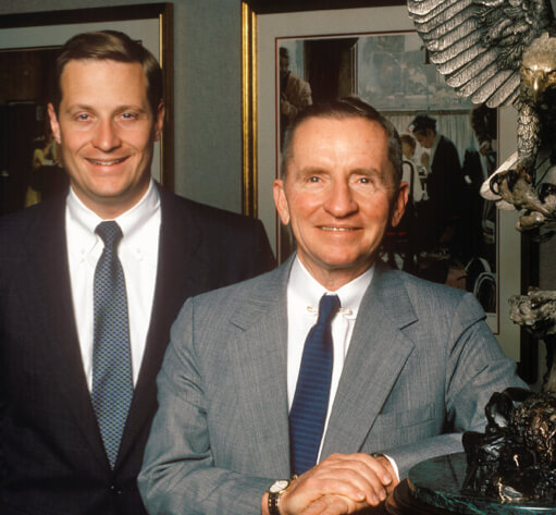 Ross Perot Sr. and Ross Perot Jr. pose for a photo.