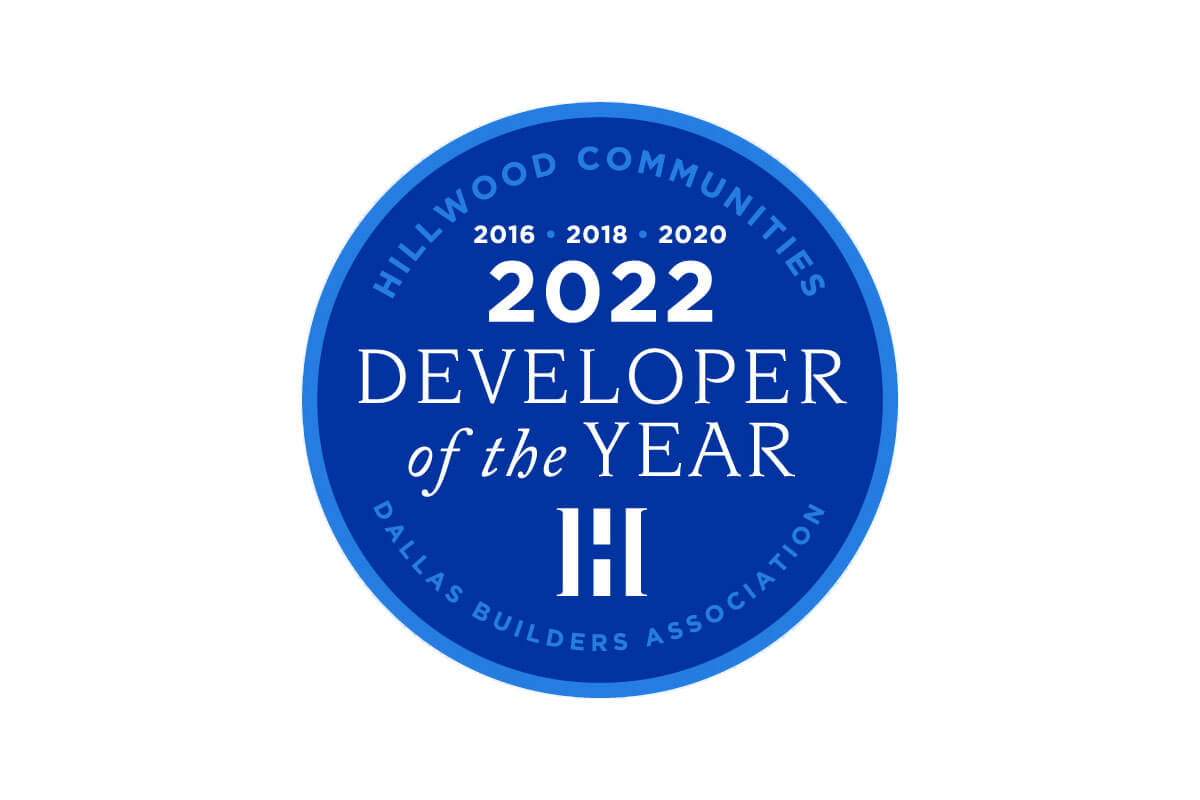 A logo and text shows Hillwood’s position as a four-time winner of the Dallas Builders Association’s Developer of the Year Award