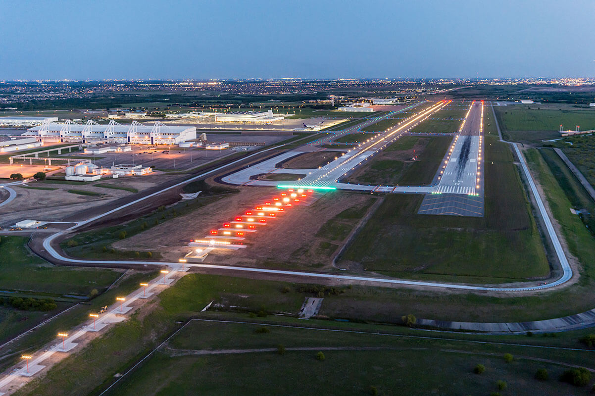 A lighted runway is seen at night at Fort Worth Alliance Airport.