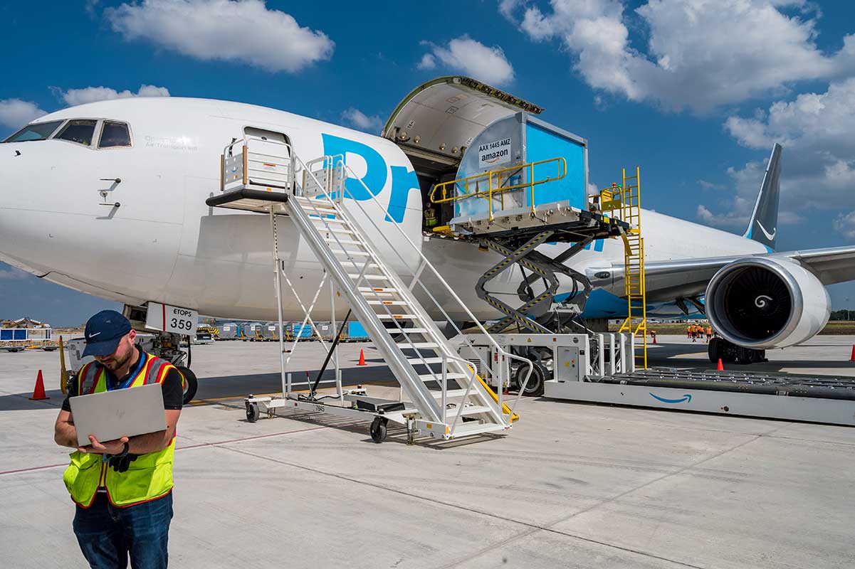 An Amazon airplane unloading cargo