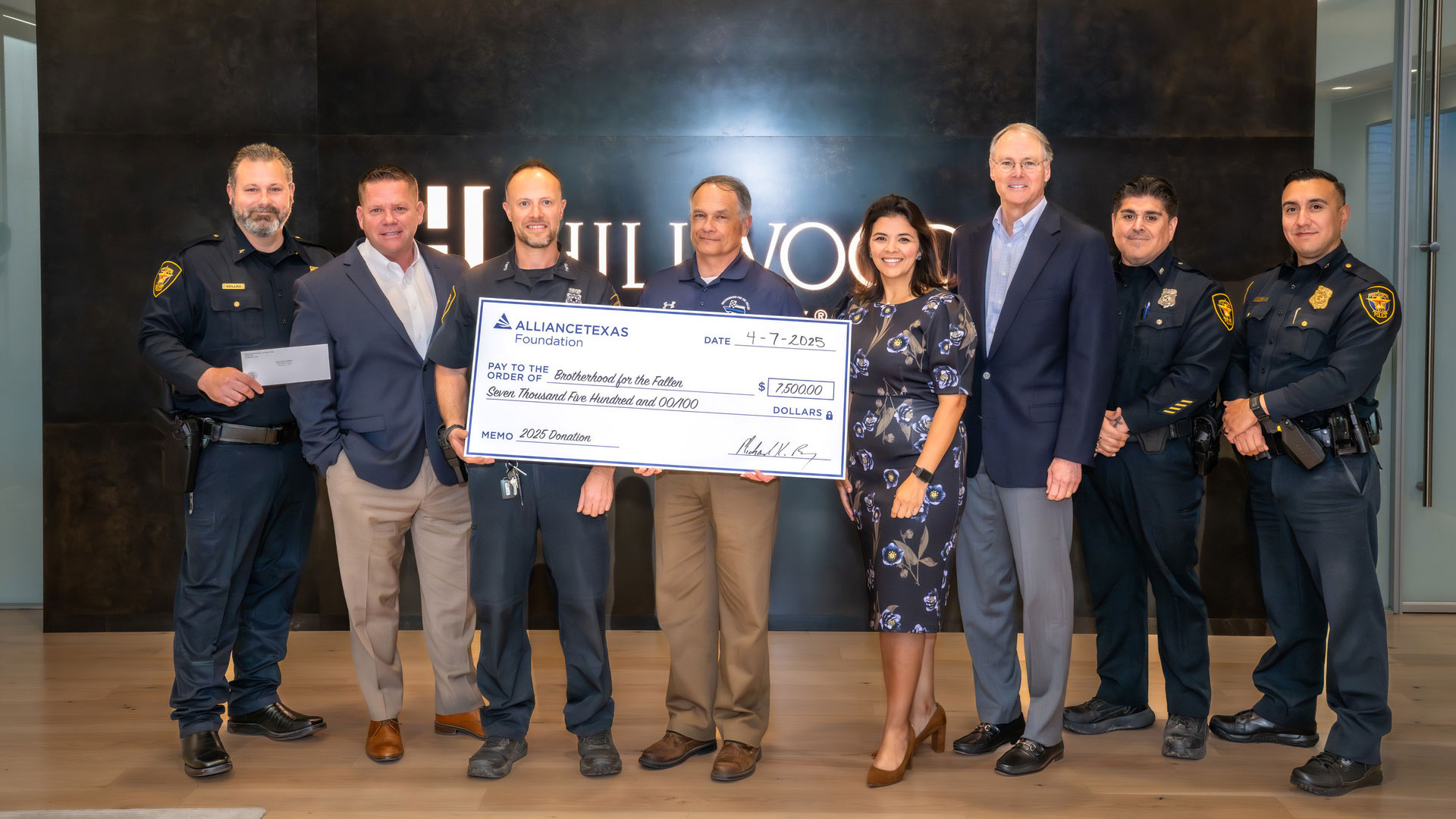 Presenting a check to the Brotherhood of the Fallen